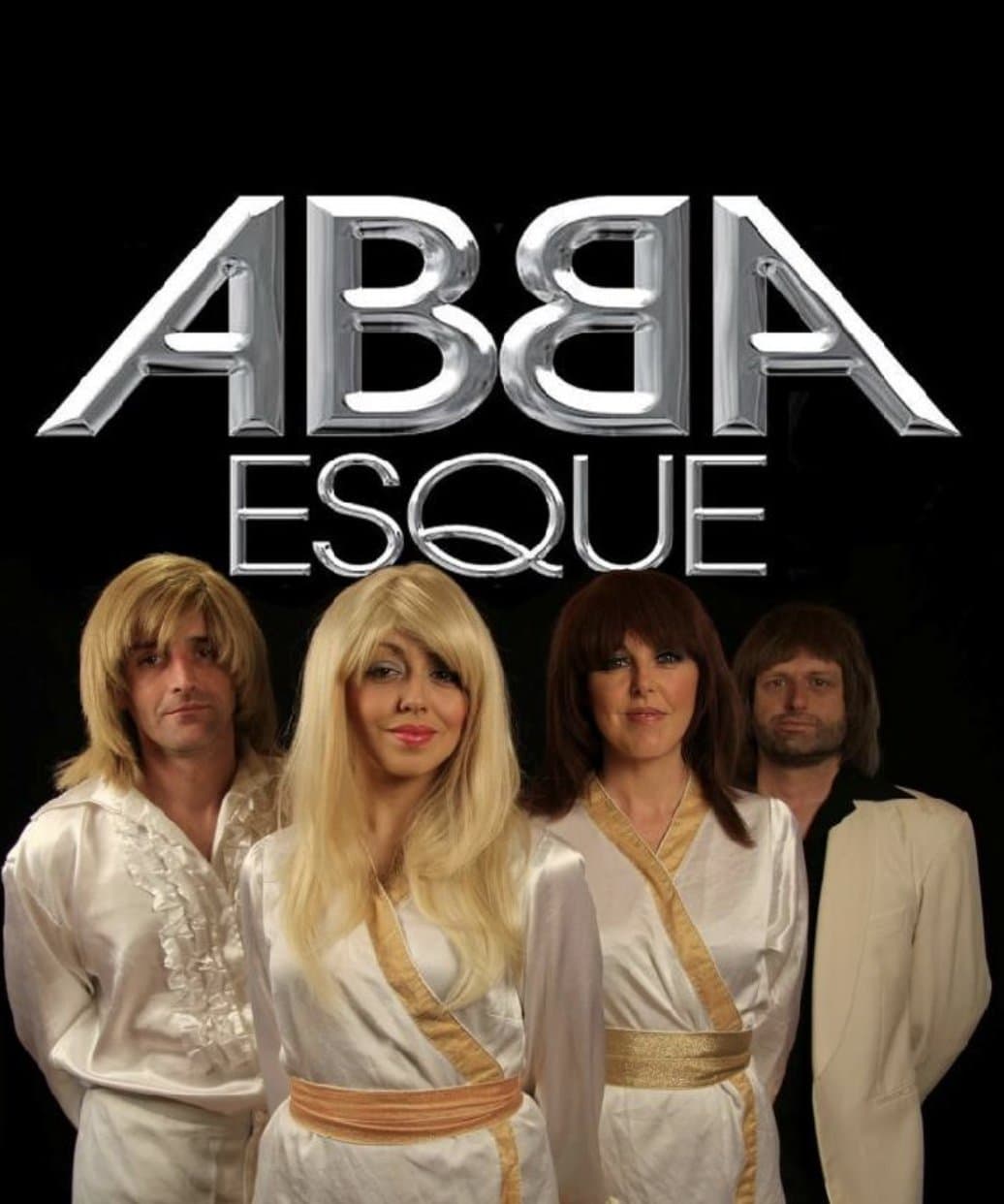 A tribute act in costume, photographed as a group.
